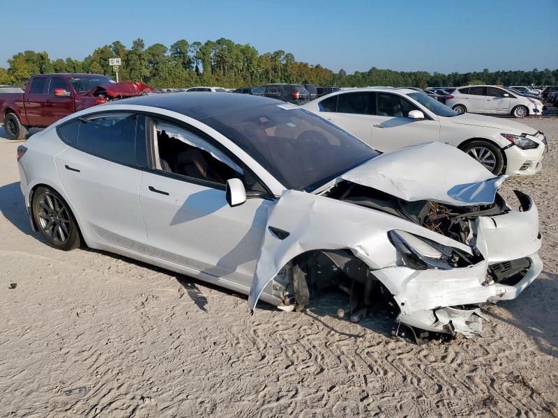 Photo 4 from auction – 2021 TESLA MODEL 3 with VIN 5YJ3E1EA1MF051648