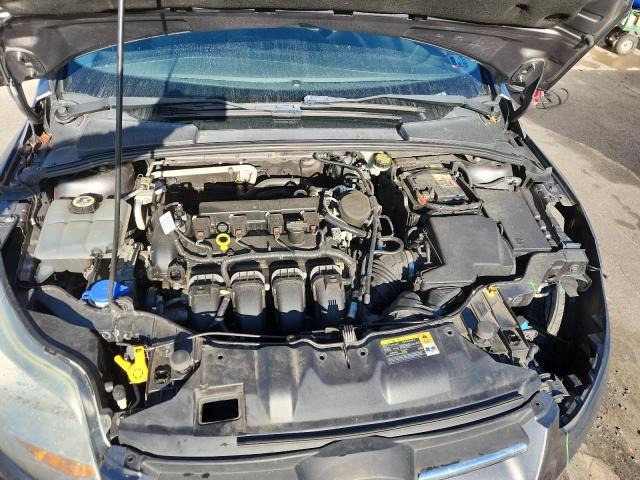 Photo 11 from auction – 2014 FORD FOCUS SE with VIN 1FADP3F23EL257575
