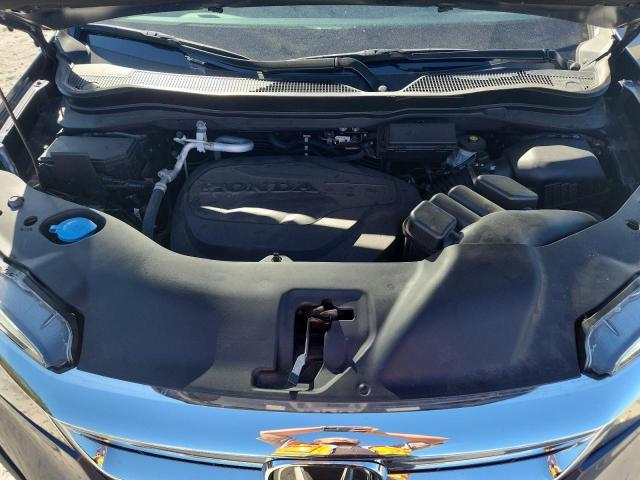 Photo 12 from auction – 2021 HONDA PILOT EXL with VIN 5FNYF5H51MB028413