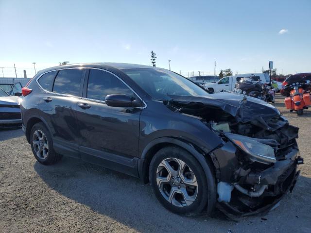 Photo 4 from auction – 2017 HONDA CR-V EXL with VIN 5J6RW2H87HL002019