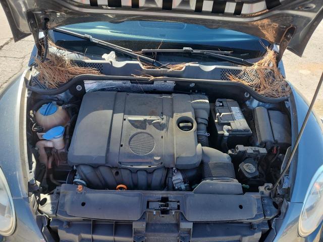 Photo 11 from auction – 2013 VOLKSWAGEN BEETLE with VIN 3VWFP7AT5DM631091