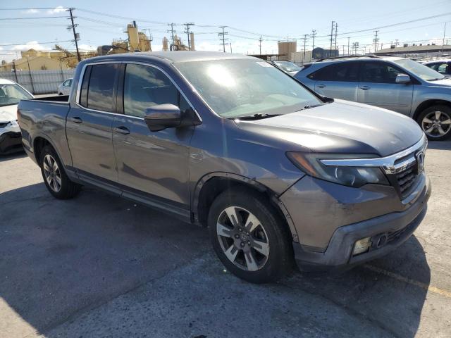 Photo 4 from auction – 2018 HONDA RIDGELINE with VIN 5FPYK2F69JB002618