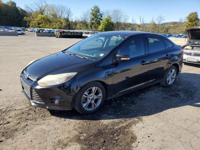 FORD FOCUS 2014 with VIN 1FADP3F2XEL301409 - Photo from auction