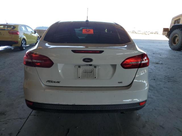 Photo 6 from auction – 2016 FORD FOCUS SE with VIN 1FADP3F21GL264205