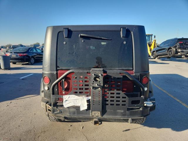 Photo 6 from auction – 2009 JEEP WRANGLER U with VIN 1J8GA69179L704906