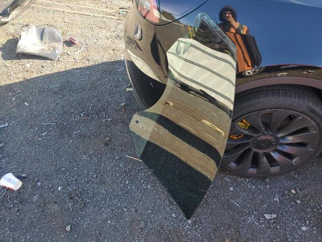 Photo 12 from auction – 2023 TESLA MODEL Y with VIN 7SAYGDEE5PA058613