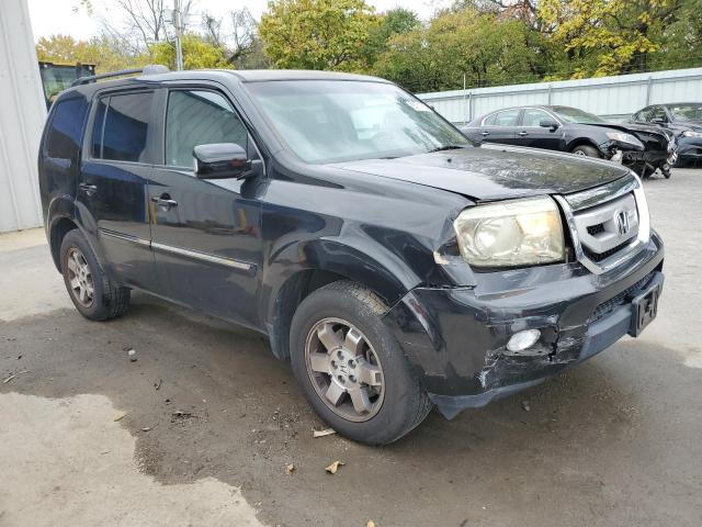 Фото 4 с аукциона – 2011 HONDA PILOT TOUR с VIN 5FNYF4H95BB070948