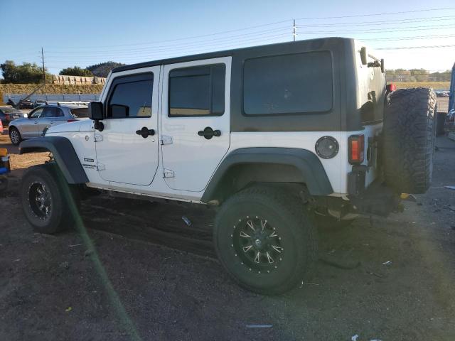 Photo 2 from auction – 2014 JEEP WRANGLER U with VIN 1C4BJWDG3EL218228