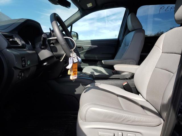 Photo 7 from auction – 2023 HONDA PASSPORT EXL with VIN 5FNYF8H56PB032169