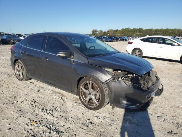 Photo 4 from auction – 2015 FORD FOCUS TITA with VIN 1FADP3J26FL304137