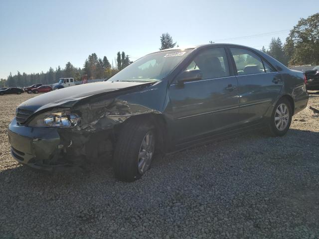 TOYOTA CAMRY LE 2002 with VIN JTDBF30K320043468 - Photo from auction