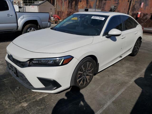 HONDA CIVIC EX 2022 with VIN JHMFE1F70NX009946 - Photo from auction