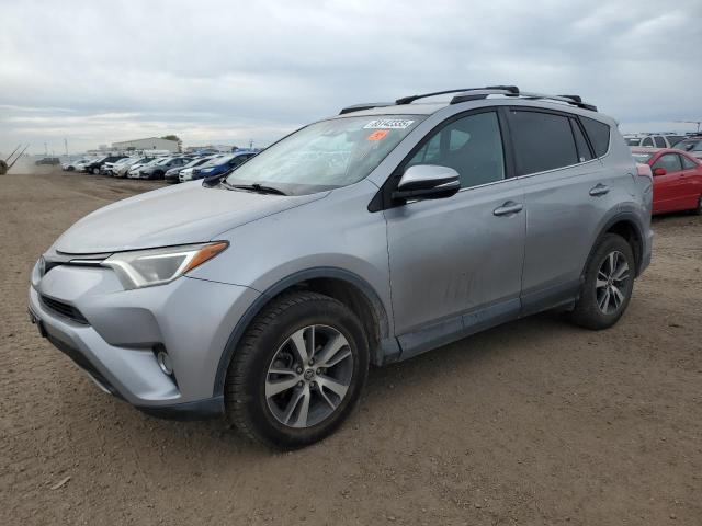 TOYOTA RAV4 XLE 2017 with VIN 2T3RFREV0HW577424 - Photo from auction