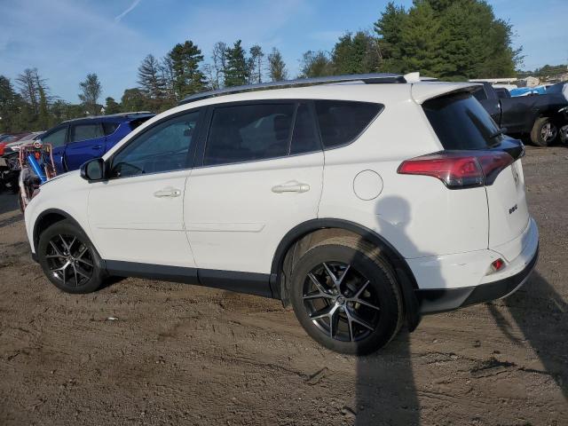 Photo 2 from auction – 2016 TOYOTA RAV4 SE with VIN JTMJFREV0GD182376