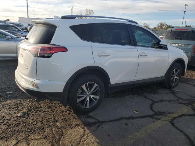 Photo 3 from auction – 2017 TOYOTA RAV4 XLE with VIN JTMRFREV3HJ127667
