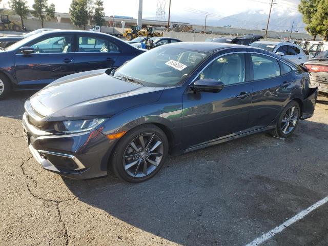 HONDA CIVIC EX 2019 with VIN JHMFC1F38KX012365 - Photo from auction