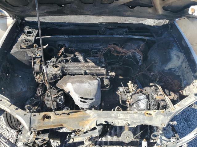 Photo 11 from auction – 2003 TOYOTA CAMRY LE with VIN JTDBE32K630157708