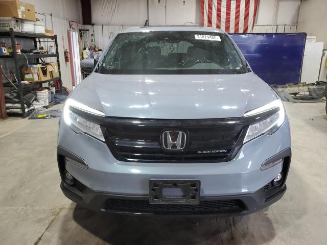 Photo 5 from auction – 2022 HONDA PILOT BLAC with VIN 5FNYF6H71NB062750