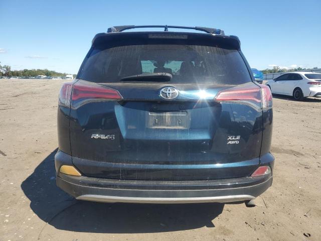 Photo 6 from auction – 2017 TOYOTA RAV4 XLE with VIN 2T3RFREV2HW685950