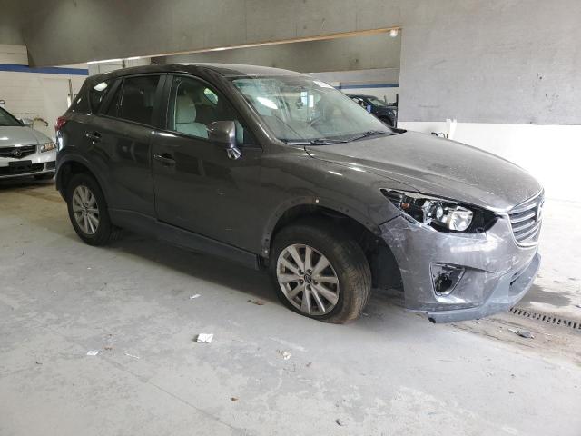 Photo 4 from auction – 2016 MAZDA CX-5 TOURI with VIN JM3KE4CYXG0713069