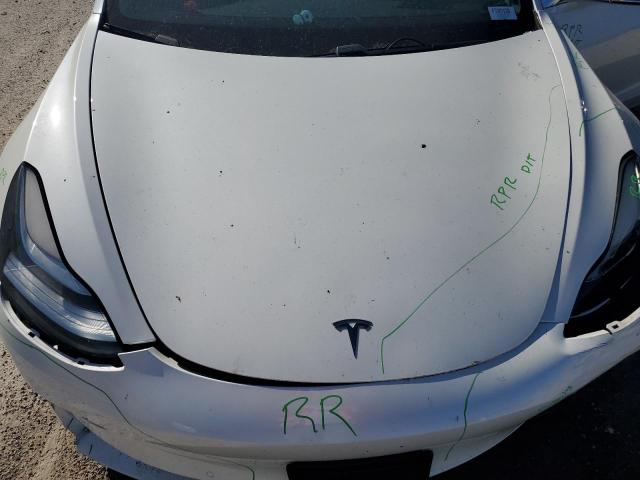 Photo 11 from auction – 2020 TESLA MODEL 3 with VIN 5YJ3E1EA4LF746138