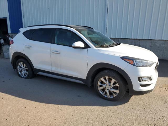 Photo 4 from auction – 2020 HYUNDAI TUCSON LIM with VIN KM8J3CA43LU273716