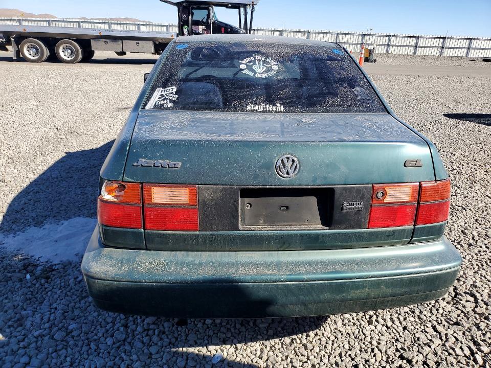 Photo 6 from auction – 1996 VOLKSWAGEN JETTA with VIN 3VWRA81H4TM056951