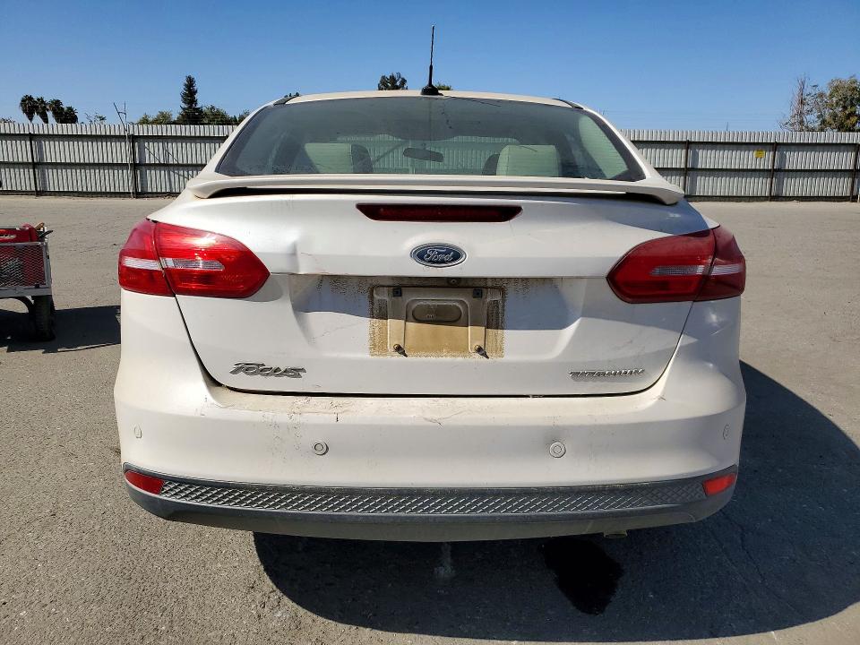Снимка 6 от търг – 2017 FORD FOCUS с VIN 1FADP3J22HL260740