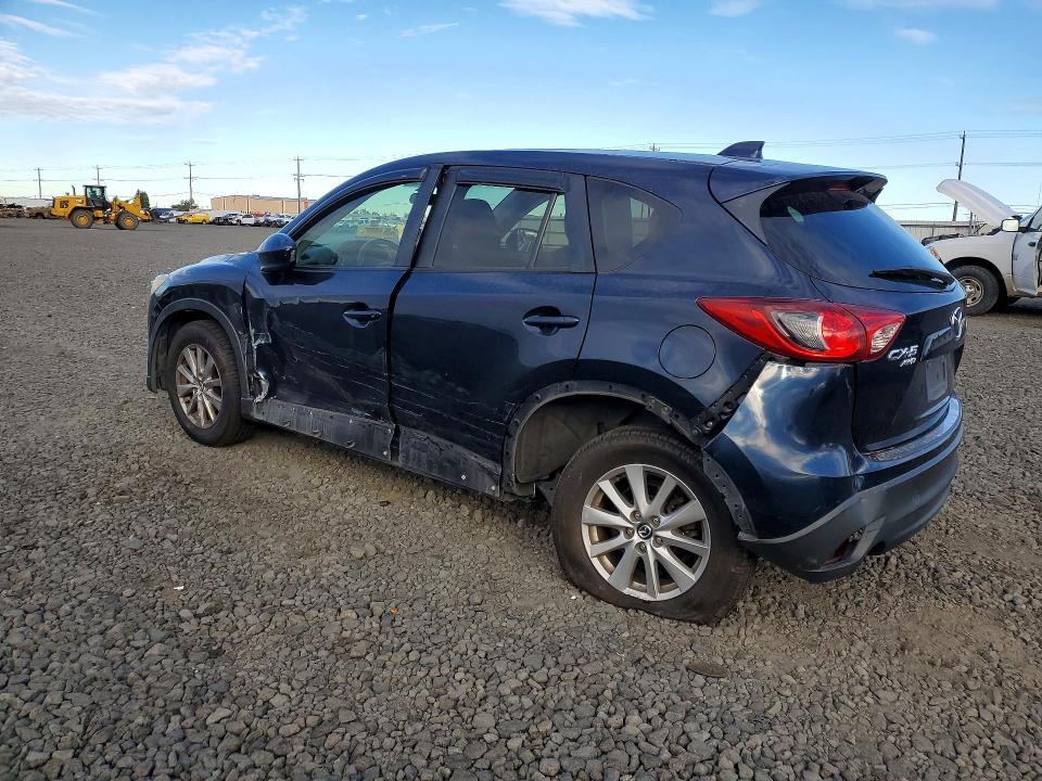Снимка 2 от търг – 2014 MAZDA CX-5 с VIN JM3KE4CY4E0423908