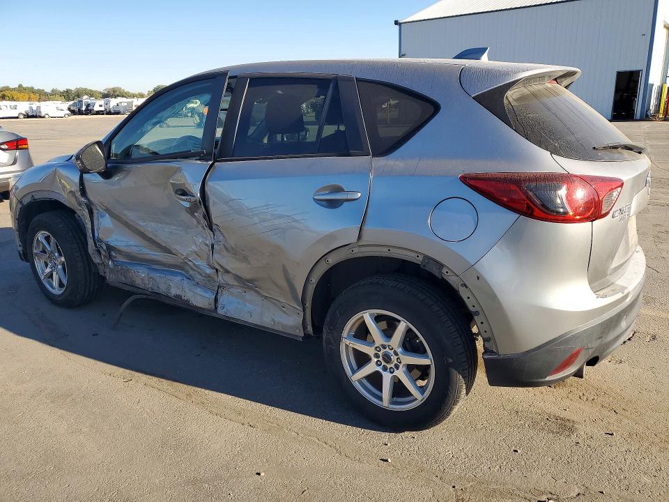 Снимка 2 от търг – 2014 MAZDA CX-5 с VIN JM3KE4DY0E0401872