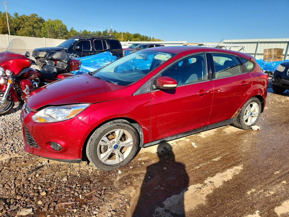 FORD FOCUS 2013 with VIN 1FADP3K21DL261032 - Photo from auction