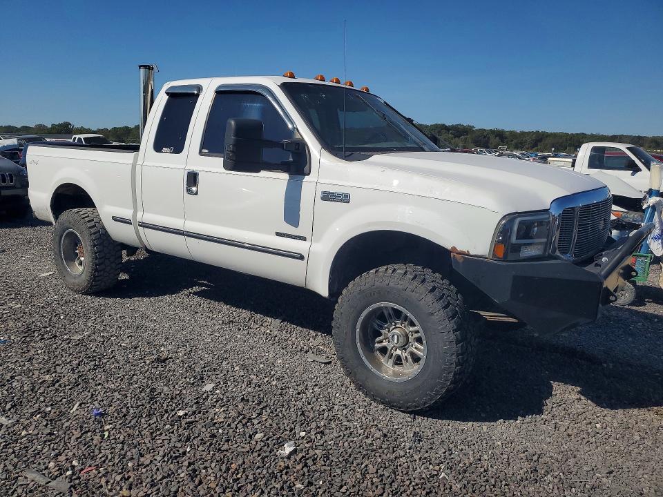 Снимка 4 от търг – 1999 FORD F250 с VIN 1FTNX21F0XEB32429