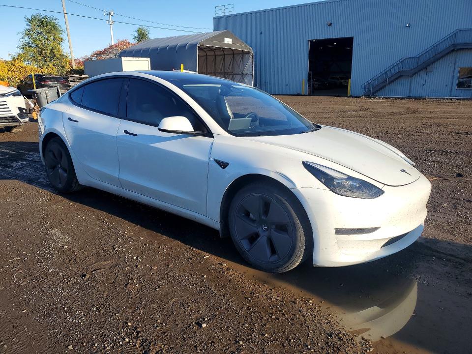 Снимка 4 от търг – 2023 TESLA MODEL 3 с VIN 5YJ3E1EAXPF482462