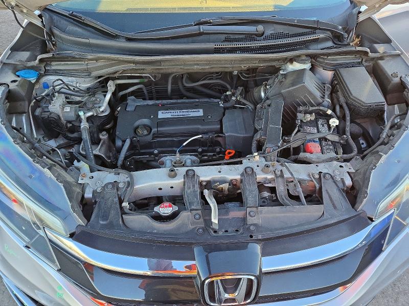 Photo 11 from auction – 2015 HONDA CR-V with VIN 2HKRM4H57FH668327