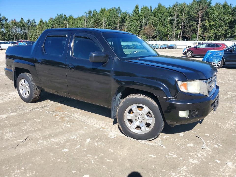 Снимка 4 от търг – 2010 HONDA RIDGELINE с VIN 5FPYK1F42AB012075