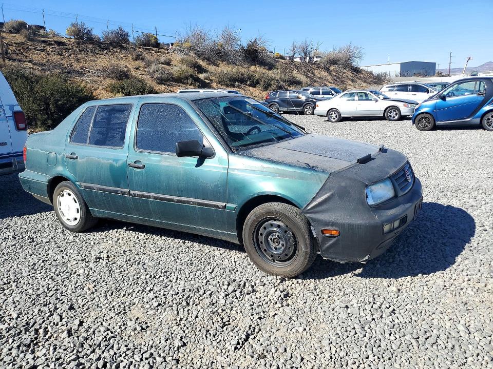 Photo 4 from auction – 1996 VOLKSWAGEN JETTA with VIN 3VWRA81H4TM056951