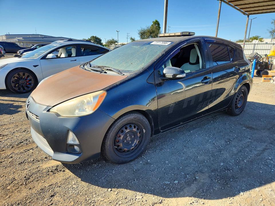 TOYOTA PRIUS C 2014 with VIN JTDKDTB32E1084460 - Photo from auction
