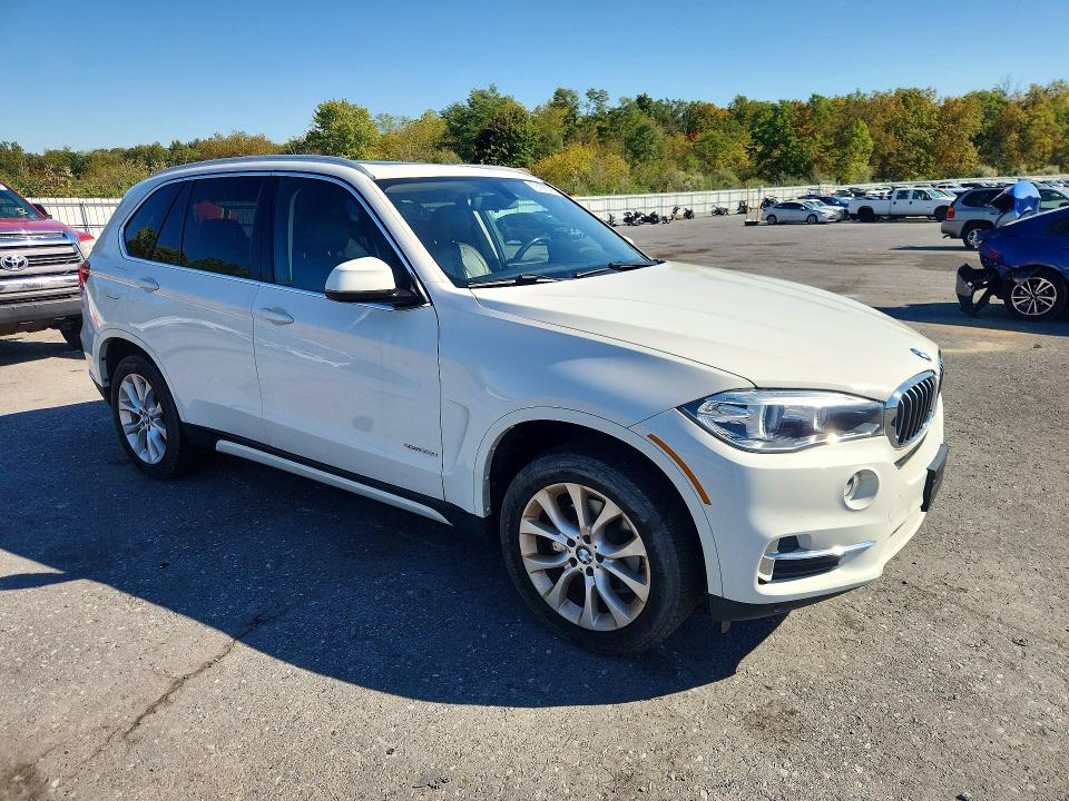 Photo 4 from auction – 2014 BMW X5 with VIN 5UXKR0C52E0H19846