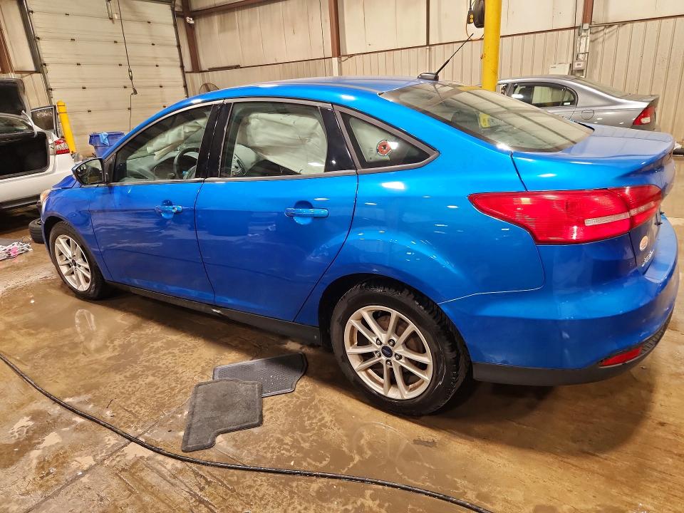 Снимка 2 от търг – 2016 FORD FOCUS с VIN 1FADP3F25GL354800