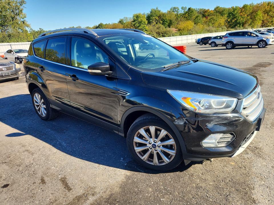 Photo 4 from auction – 2017 FORD ESCAPE with VIN 1FMCU9J93HUE52205