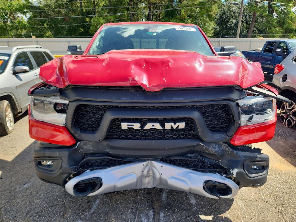 Снимка 5 от търг – 2019 RAM 1500 с VIN 1C6RRELG1KN792885