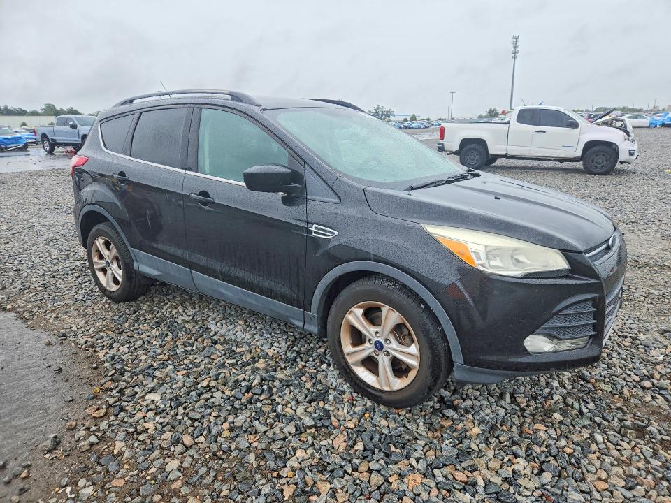 Foto 4 de la subasta – 2014 FORD ESCAPE con VIN 1FMCU0GX5EUD77472
