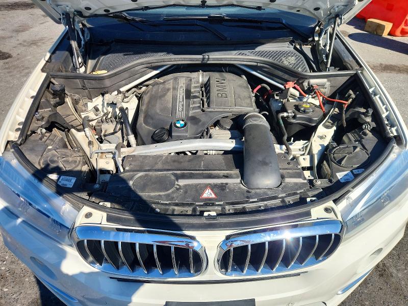 Photo 12 from auction – 2014 BMW X5 with VIN 5UXKR0C52E0H19846
