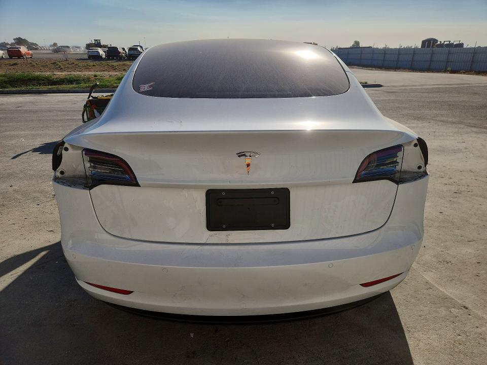 Снимка 6 от търг – 2022 TESLA MODEL 3 с VIN 5YJ3E1EA4NF375629