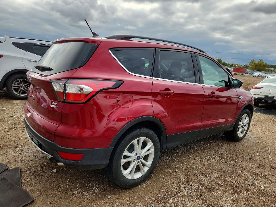 Photo 3 from auction – 2018 FORD ESCAPE with VIN 1FMCU9GD3JUA18531