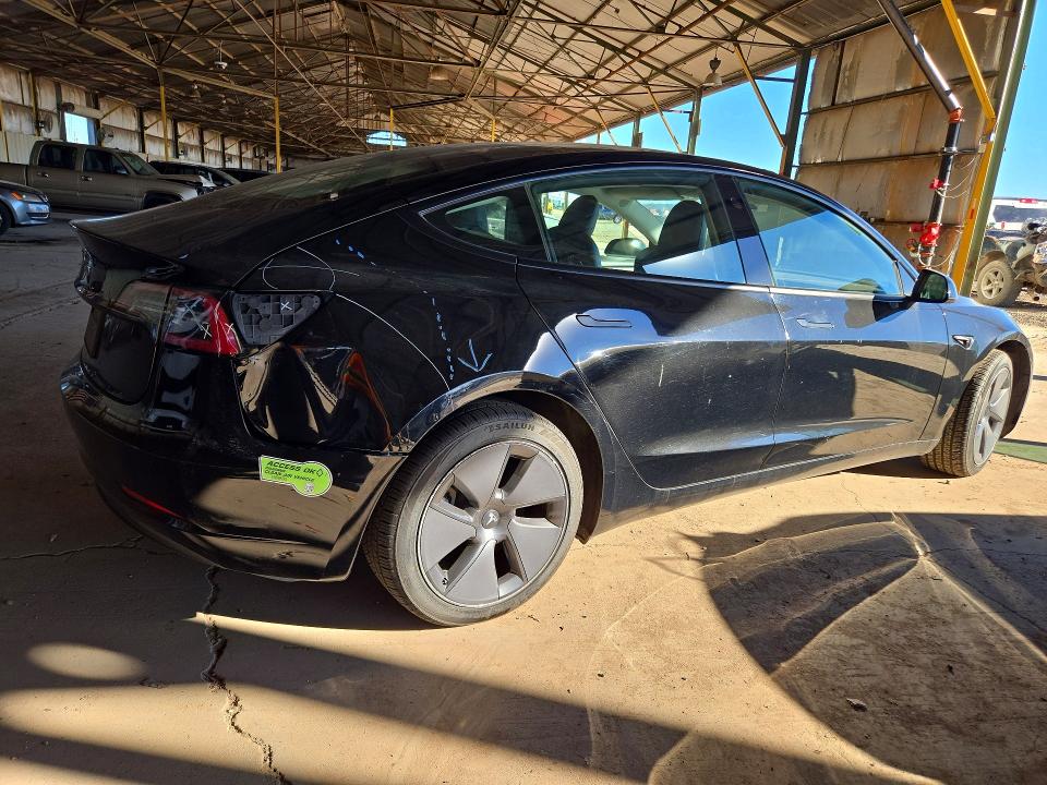Снимка 3 от търг – 2023 TESLA MODEL 3 с VIN 5YJ3E1EA8PF453655