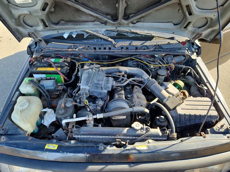 Photo 11 from auction – 1998 CHEVROLET TRACKER with VIN 2CNBE1867W6905372