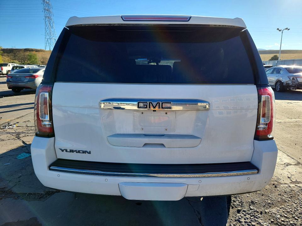 Foto 6 de la subasta – 2015 GMC YUKON con VIN 1GKS2CKJ0FR282028