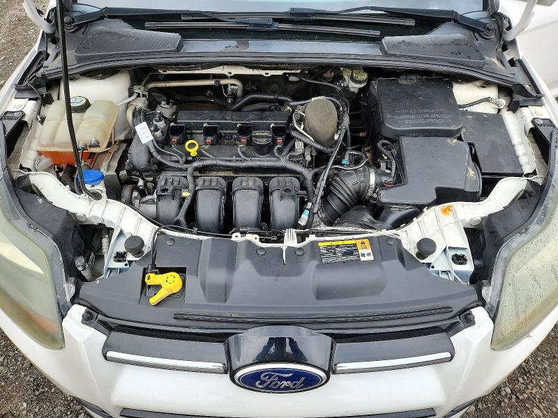 Снимка 11 от търг – 2013 FORD FOCUS с VIN 1FADP3J20DL259936