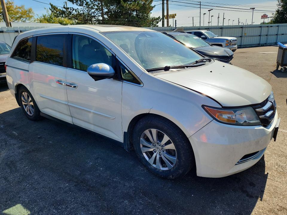 Снимка 4 от търг – 2014 HONDA ODYSSEY с VIN 5FNRL5H60EB076900